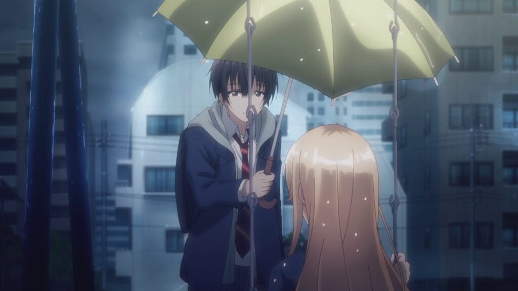 雨が降る夜の公園で、ブランコに座る金髪の少女（椎名真昼）に対し、少年（藤宮周）が静かに傘を差し出す様子。